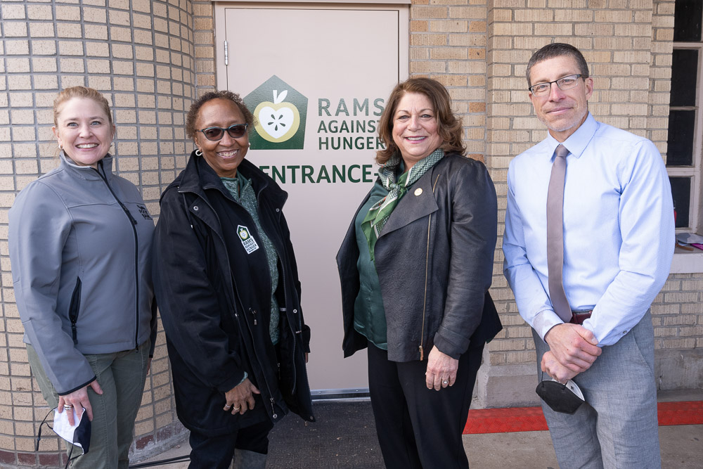 Amy Pezzani, CEO for the Food Bank for Larimer County; Blanche Hughes, Vice President for Student Affairs at CSU; President McConnell; and Mike Buttram, needs program manager for CSU’s Student Leadership, Involvement, and Community Engagement (SLiCE) office.