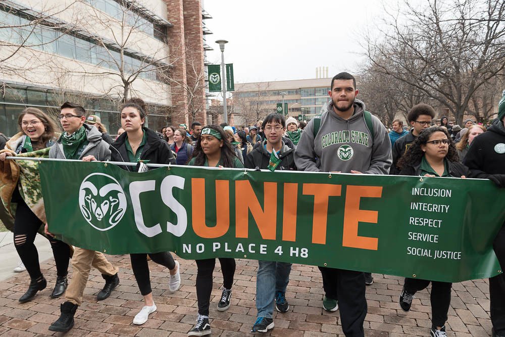 Members of the Colorado State University and Fort Collins march through the Plaza during CSUnite, March 29, 2018, to make a statement in support of CSU’s community principles and against acts of hate and intimidation that have taken place on campus this academic year.